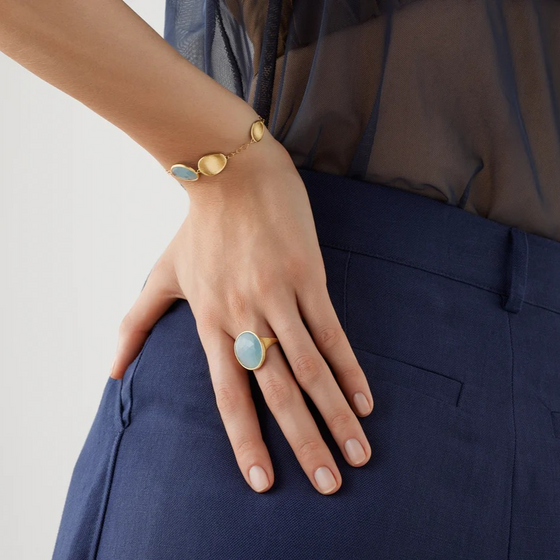 Bague pour femme en or jaune 18 carats et aigue-marine bleue. Bague Lunaria Marco Bicego AB564-AQD-53