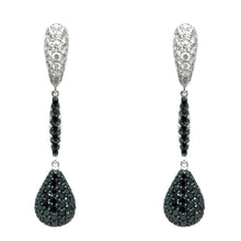  Boucles d'oreilles pendantes pour femme en or blanc noirci pavées de diamants blancs et noirs. Boucles d'Oreilles Michaud 137897