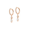 Boucles d'oreilles pendantes pour femme en or rose pavées de diamants blancs. Boucles d'Oreilles Michaud 