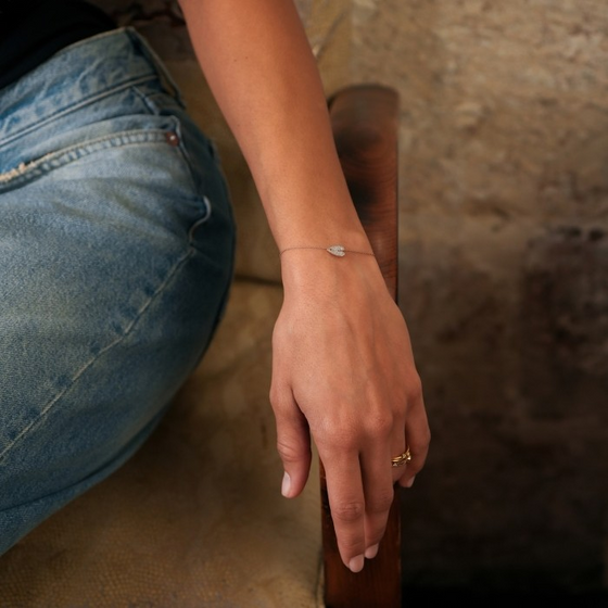 Bracelet pour femme en or rose et charm coeur en diamants blancs. Bracelet Angèle Ginette NY BAND