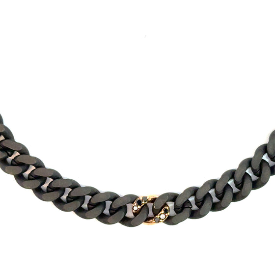 Bracelet pour homme et femme en titane noir avec un maillon en or rose et diamants noirs. Bracelet Audace Anteo AUDACE6.1PN