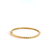 Bracelet jonc pour femme et homme en or jaune avec un motif géométrique. Bracelet Michaud BRY13265.G