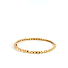  Bracelet jonc pour femme et homme en or jaune avec un motif géométrique. Bracelet Michaud BRY13265.G