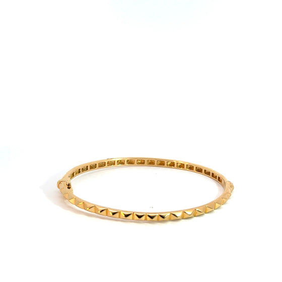 Bracelet jonc pour femme et homme en or jaune avec un motif géométrique. Bracelet Michaud BRY13265.G