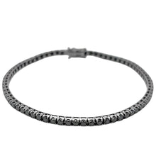  Bracelet tennis pour homme et femme en or blanc noirci et diamants noirs. Bracelet Tennis Michaud 152702
