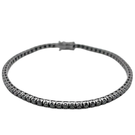 Bracelet tennis pour homme et femme en or blanc noirci et diamants noirs. Bracelet Tennis Michaud 152702