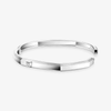 Moderniste bracelet, medium model Moderniste bracelet in 18-karat white gold, set with a brilliant-cut diamond. Mirror-polish finish on the outer surface.