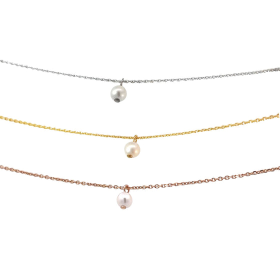 Suspended White Pearl Charm