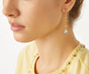 Longues boucles d'oreilles pendantes en or jaune 18 ct ornées d'une topaze cyan