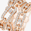Bague trois rangs Move Link Bague trois rangs Move Link en or rose 18 carats, ornée de motifs sertis de diamants taille brillant et d'un diamant mobile en leur centre.