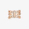 Bague trois rangs Move Link Bague trois rangs Move Link en or rose 18 carats, ornée de motifs sertis de diamants taille brillant et d'un diamant mobile en leur centre.