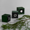 Remontoir pour une montre vert foncé. Remontoir Startbox SwissKubik. Reference: SK01.STB.002