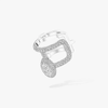 Clip d'oreille Divine Enigma Boucle d'oreille clip Divine Enigma en or blanc 18 carats, sertie d'un diamant taille ovale et de diamants taille brillant. Pour oreille gauche.