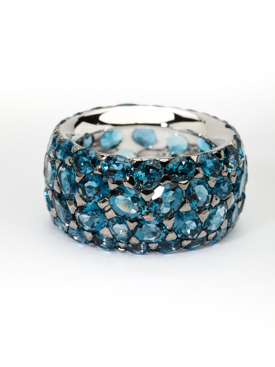 White gold ring and blue topaz