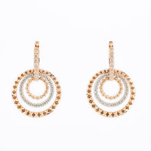 White and rose gold earrings