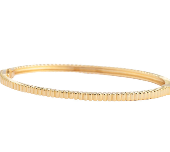 Bracelet jonc pour femme et homme en or jaune avec un motif géométrique. Bracelet Michaud 1043937