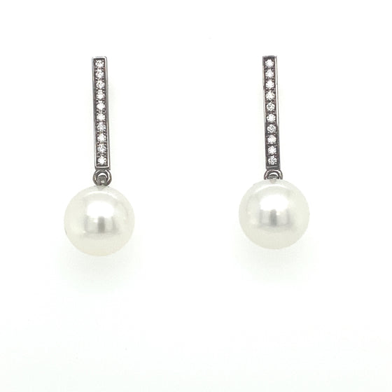 Boucles d'oreilles or blanc rhodié noir perles blanches et diamants